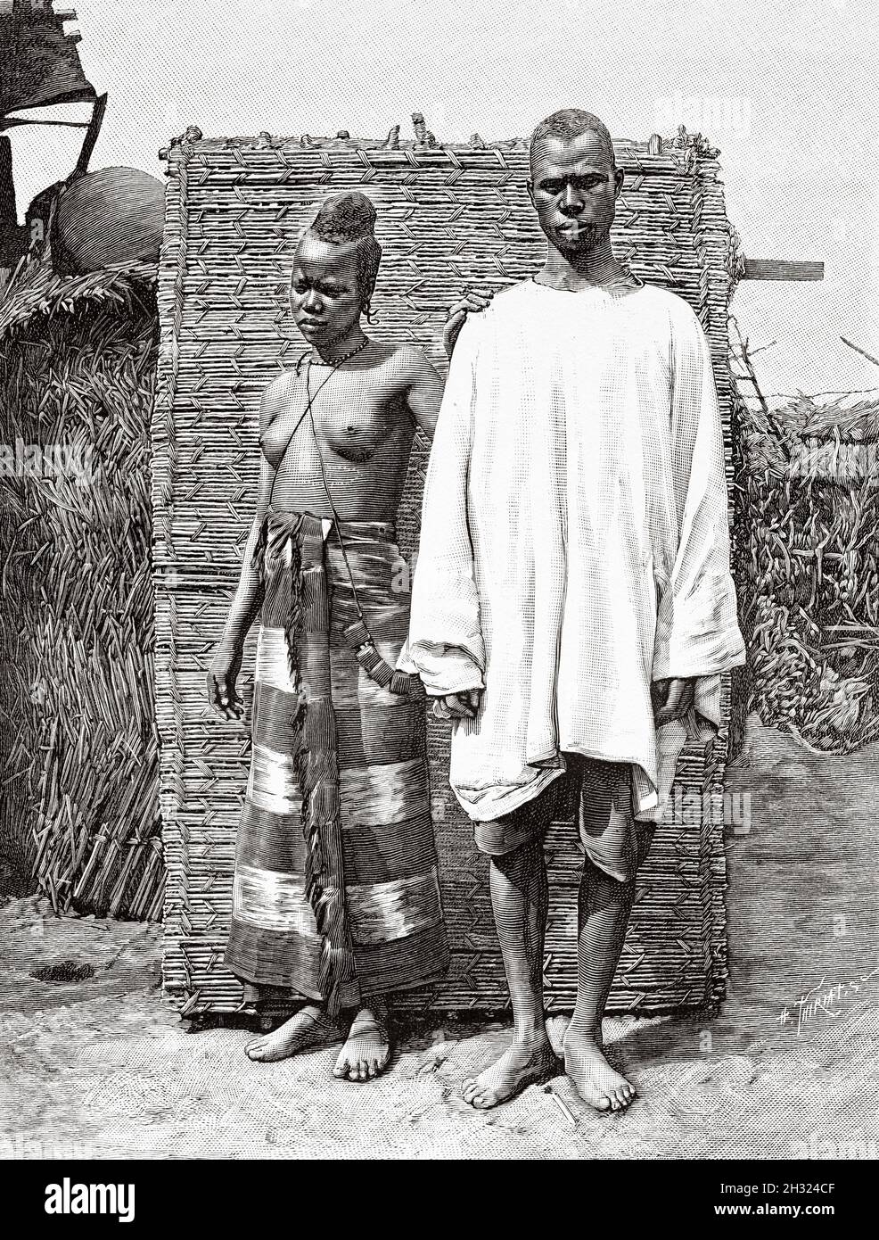 Young Foulah girl and man in the village of Kandenbel. Guinea-Bissau Africa. Old 19th century engraved illustration, Journey through Senegambia and Portuguese Guinea by captain Henri Brossard-Faidherbe (1855-1893) from Le Tour du Monde 1889 Stock Photo