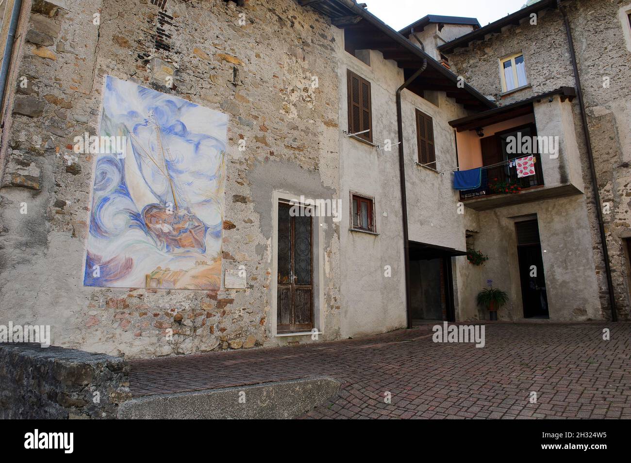 Europe, Italy, Lombardy, province of Lecco. Parlasco, a painted village of the History of Lasco outlaw of Valsassina. 14 artists created the murals in Stock Photo