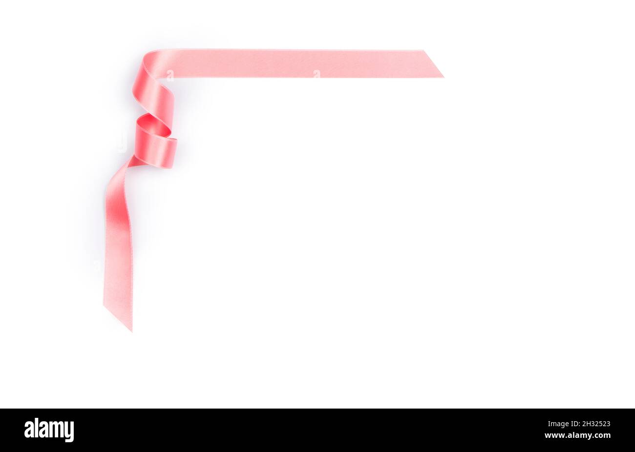 Pink streamer ribbon on white background Stock Photo Alamy