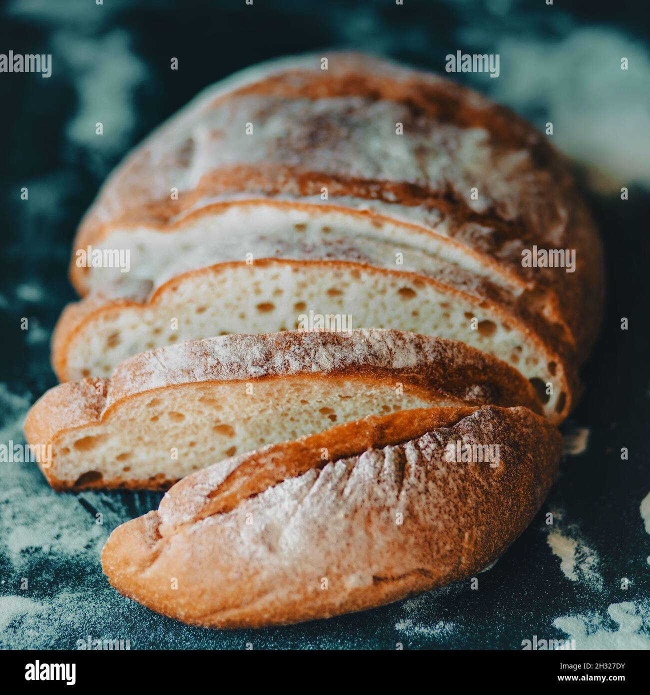 Fresh crusty loaf of artisanal homemade bread baked in a Lodge Dutch oven  cast iron pot in an doven at high temperatures Stock Photo - Alamy