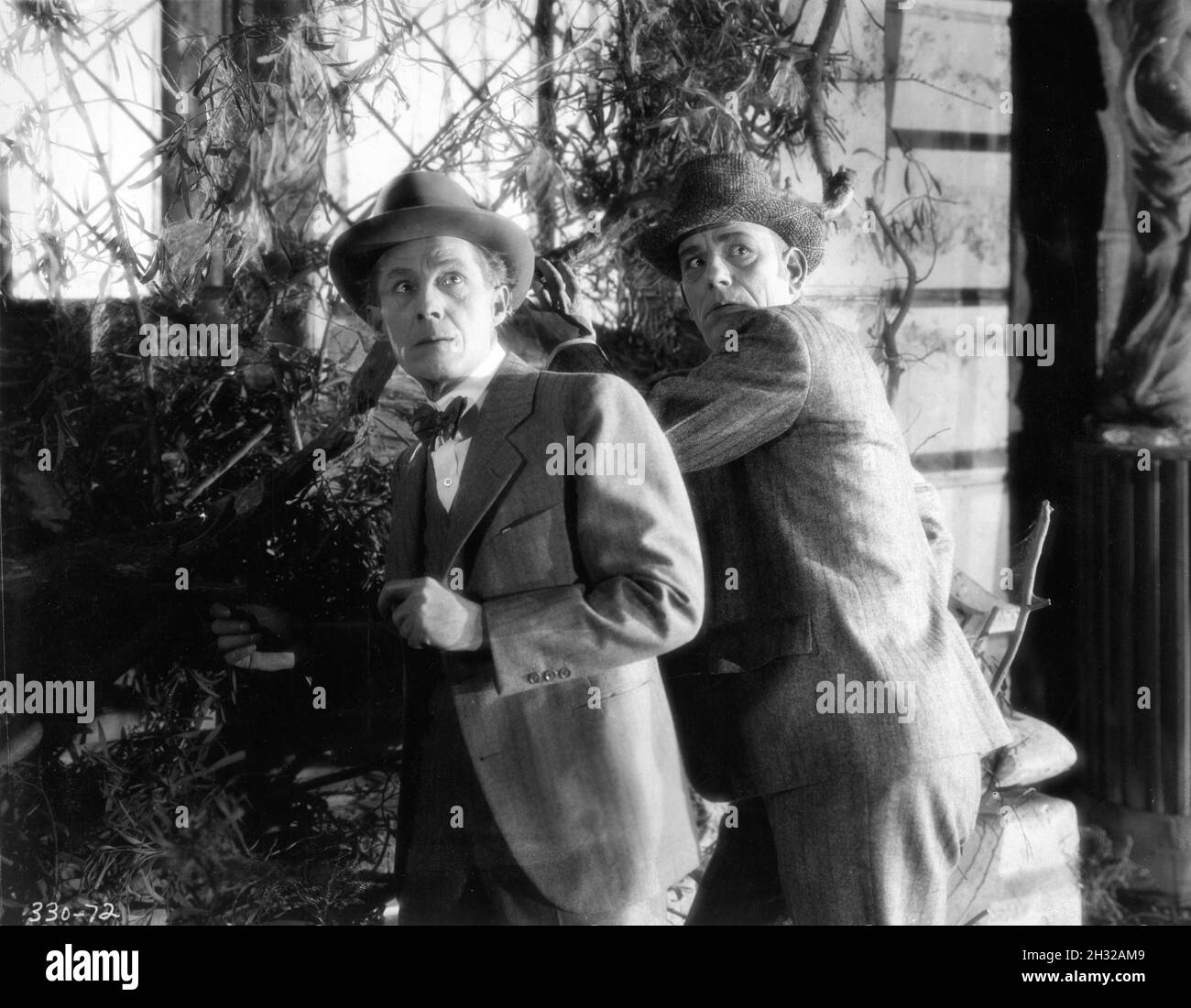 HENRY B. WALTHALL and LON CHANEY in LONDON AFTER MIDNIGHT 1927 director TOD BROWNING story The Hypnotist by Tod Browning scenario Waldemar Young wardrobe Lucia Coulter Metro Goldwyn Mayer Stock Photo