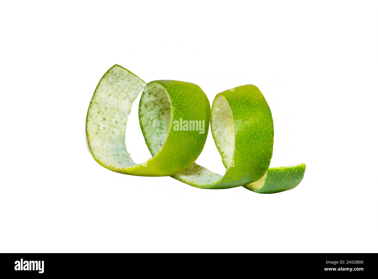 Green peel cut closeup isolated on white background Stock Photo