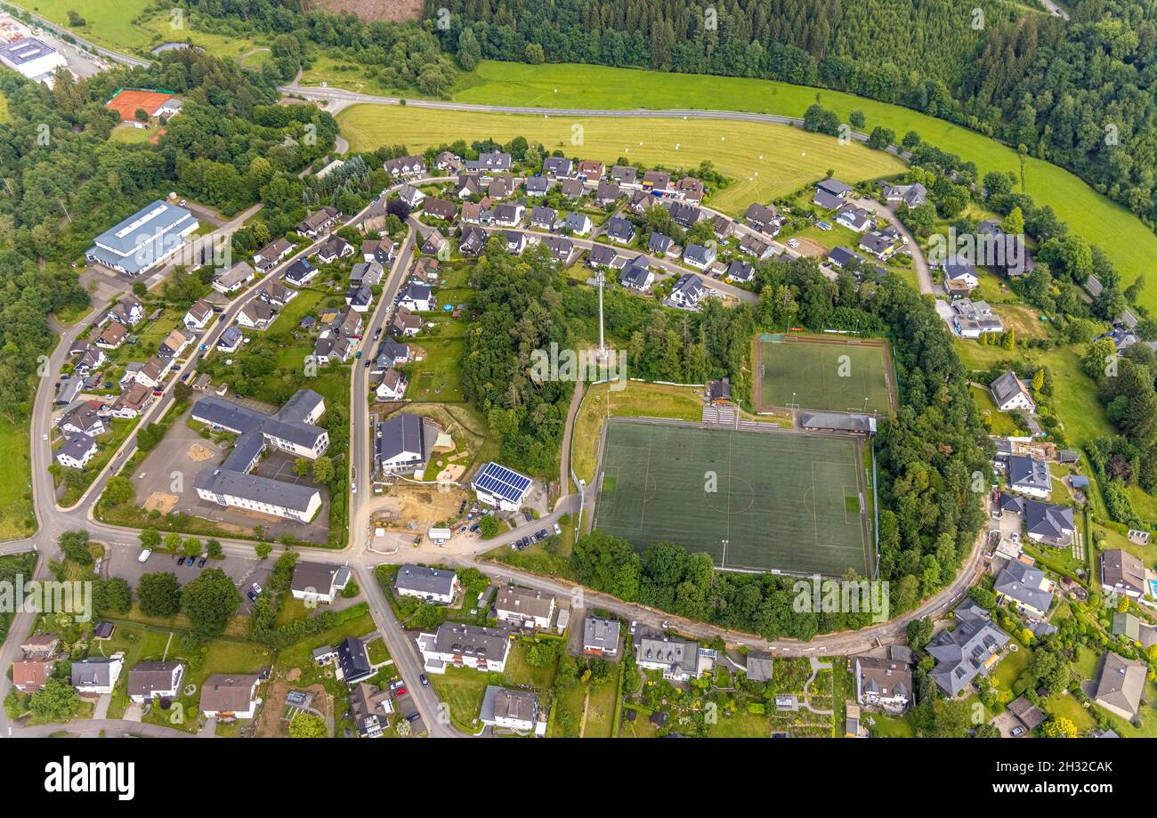Aerial view, housing estate and sports field Am Buschfeld, Drolshagen, Sauerland, North Rhine-Westphalia, Germany, DE, Europe, football field, propert Stock Photo