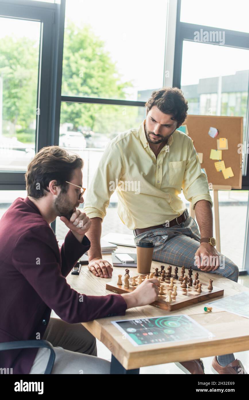 Businessman`s Hand Playing Chess Game To Development Analysis Ne Stock  Photo - Image of competition, business: 123928716