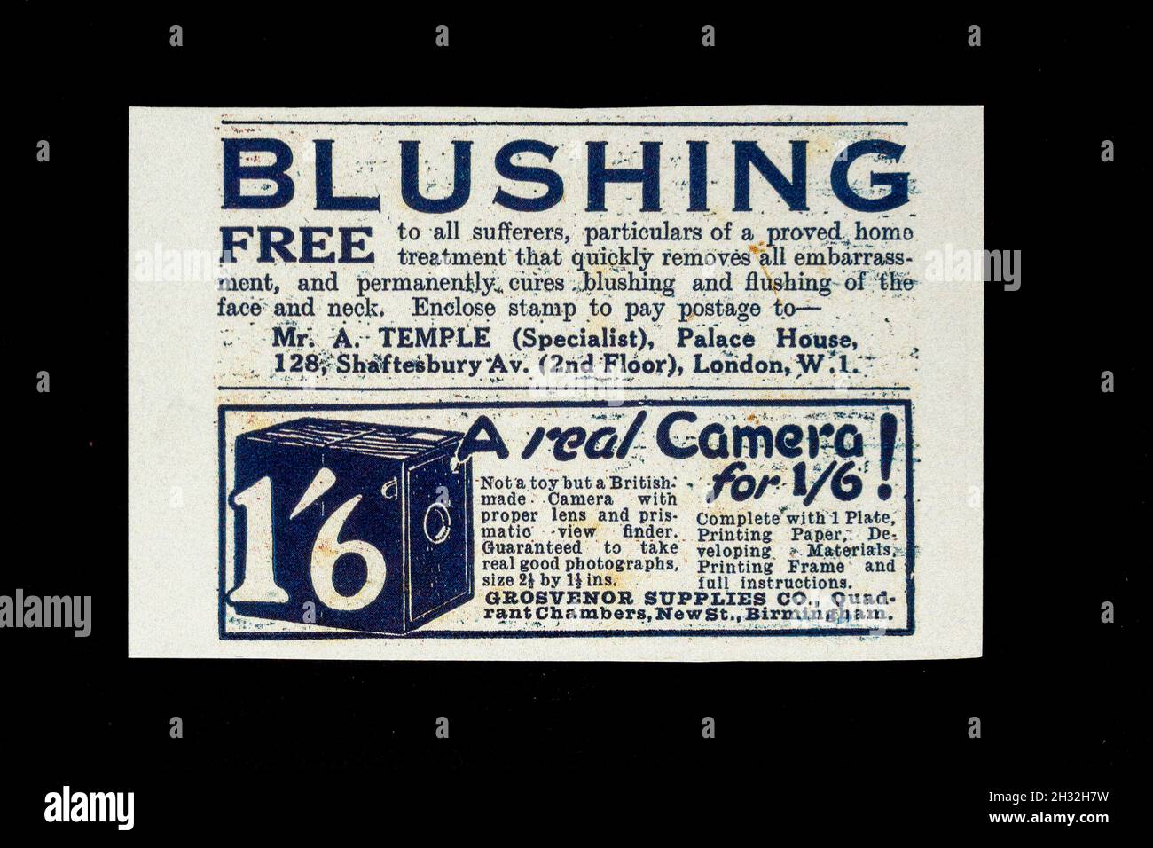 Advert (replica) for a home treatment to cure blushing and a box camera from the 1920's. Stock Photo