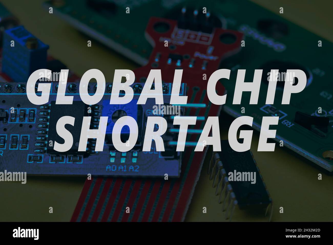 CPU chip and semiconductors with car toy. Global car chip shortage. Microchip shortage creates