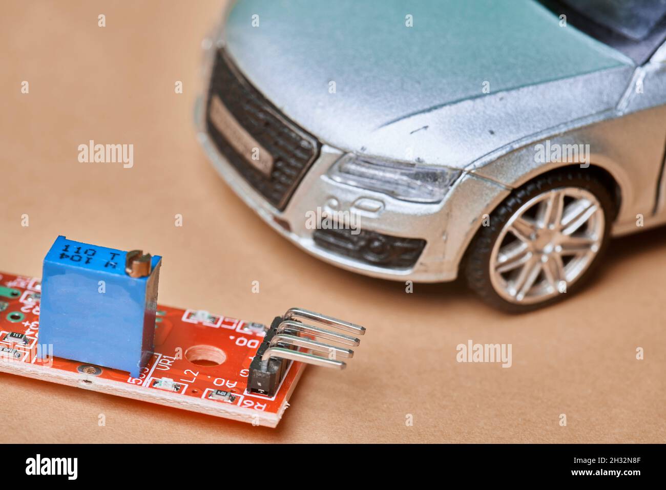 CPU chip and semiconductors with car toy. Global car chip shortage. Microchip shortage creates