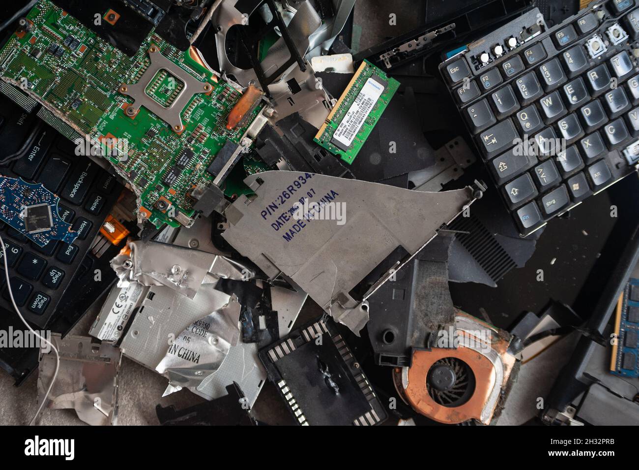 A broken laptop computer in the trash Stock Photo - Alamy