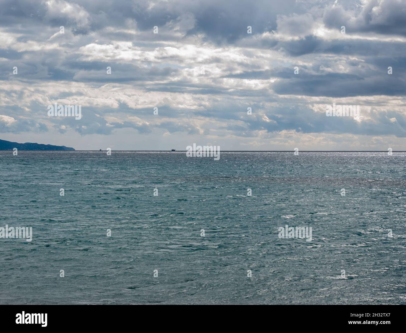 cloudy sky with gray clouds on the horizon over the sea Stock Photo - Alamy