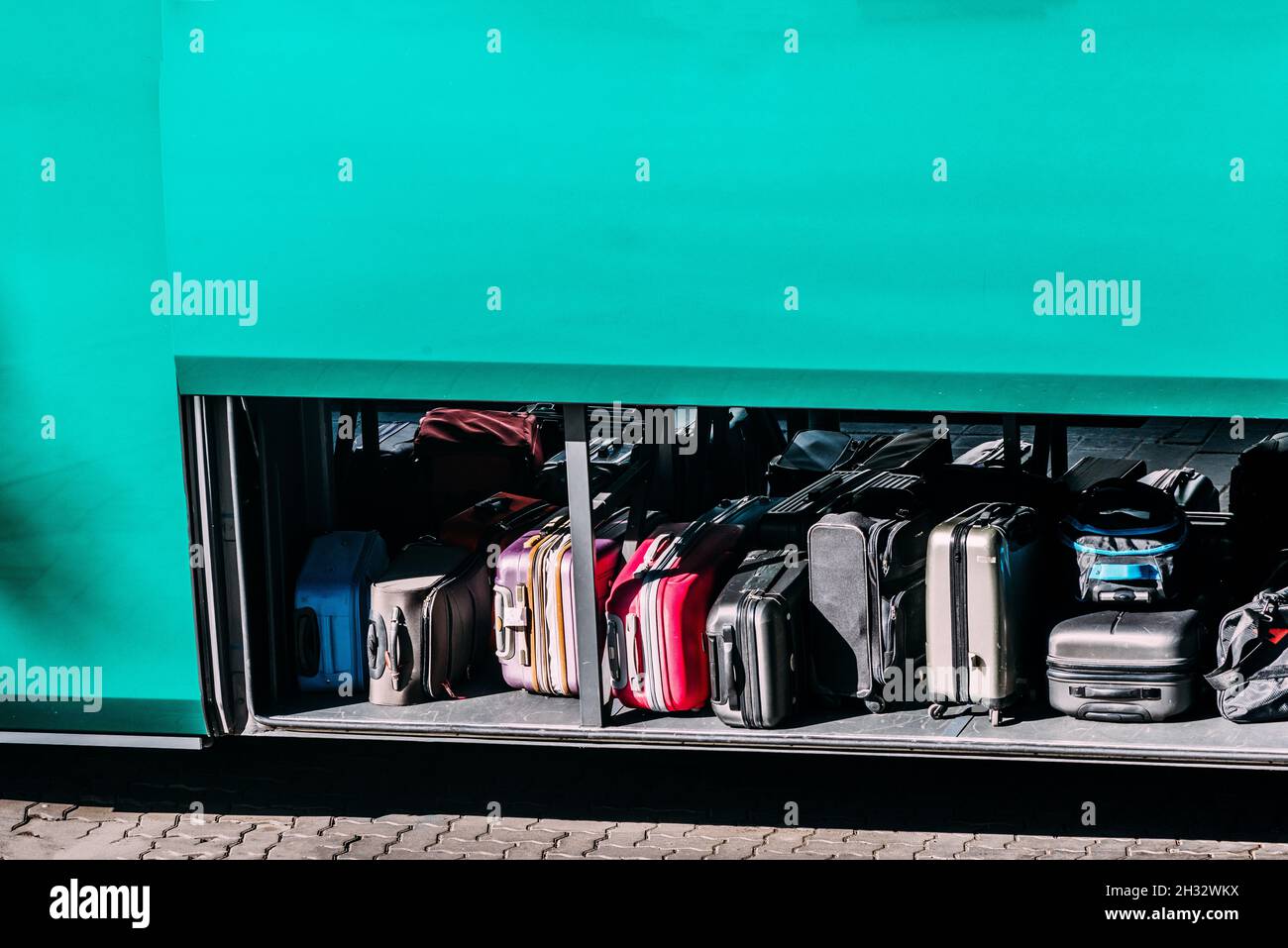 Green bus luggage compartment Stock Photo Alamy