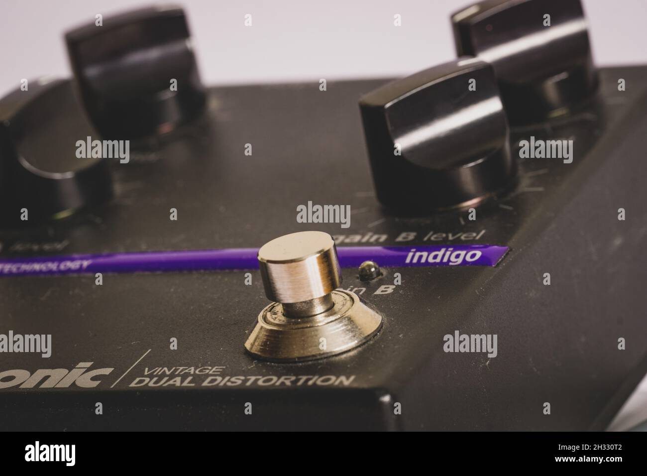 Black vintage guitar distortion effect pedal Stock Photo