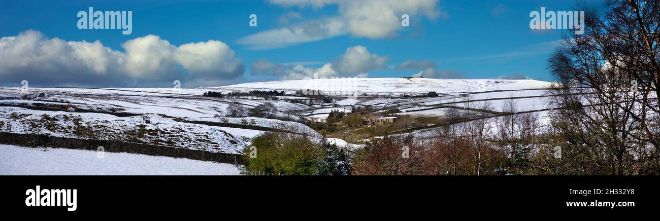 Panoramic view of a Yorkshire dale after an unexpected snowfall in April Stock Photo