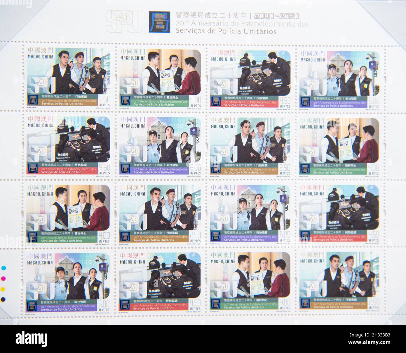 (211025) -- MACAO, Oct. 25, 2021 (Xinhua) -- Photo taken on Oct. 25, 2021 shows the special stamps to mark the 20th anniversary of the Unitary Police Service, in south China's Macao. The Macao Post would issue souvenir stamps to mark the 150th anniversary of the Kiang Wu Hospital Charitable Association on Oct. 28, the 20th anniversary of the Unitary Police Service on Oct. 29 and the 20th anniversary of Macao Customs Service on Nov. 1. (Xinhua/Cheong Kam Ka) Stock Photo