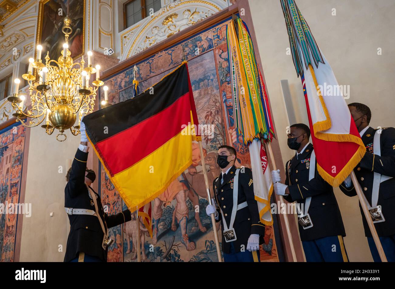 Munich, Germany. 25th Oct, 2021. US soldiers sort the flags before the  start of the Bavarian Prime Minister's flag ribbon award ceremony for US  Army Europe stationed in Bavaria. The event takes