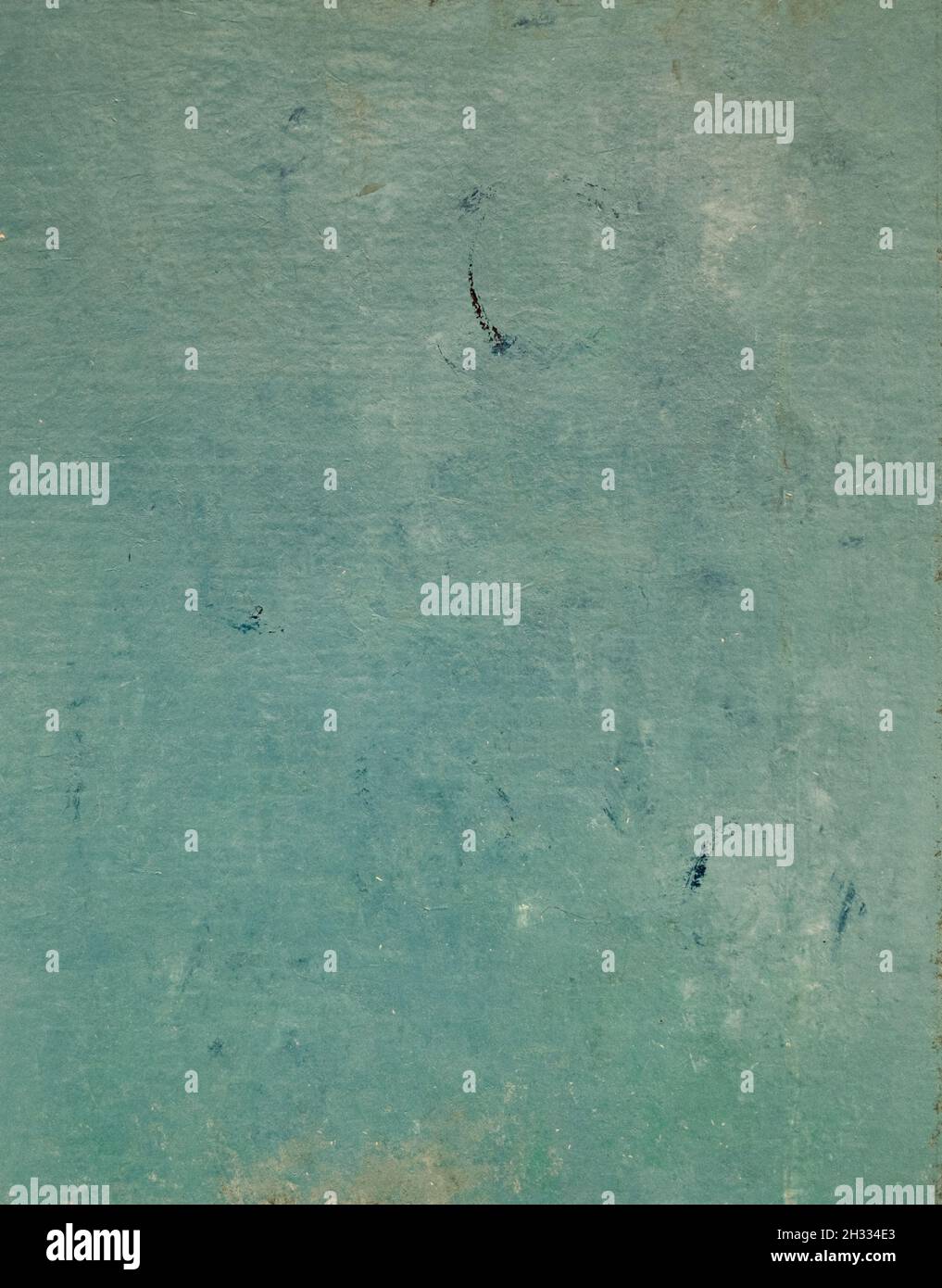 Abstract background of paper sheet painted in aquamarine color with traces of blue paint Stock Photo