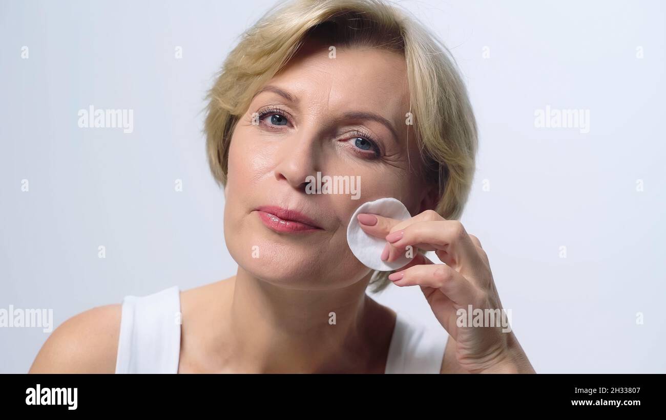 Mature woman clean face hi-res stock photography and images - Alamy