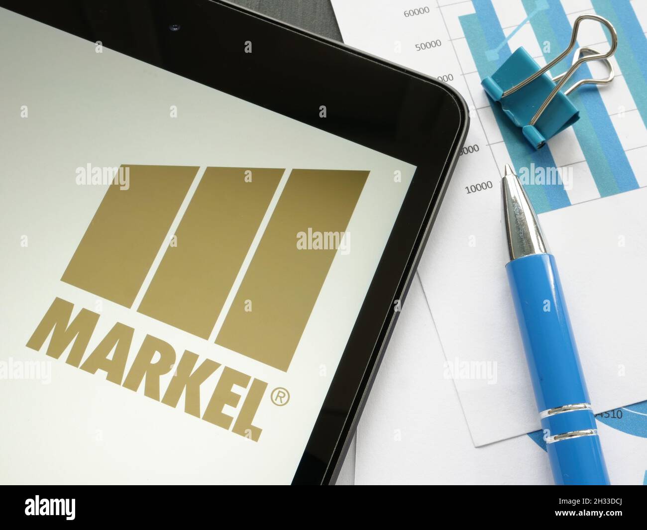 KYIV, UKRAINE - October 21, 2021. Markel Corporation logo on the screen and papers. Stock Photo