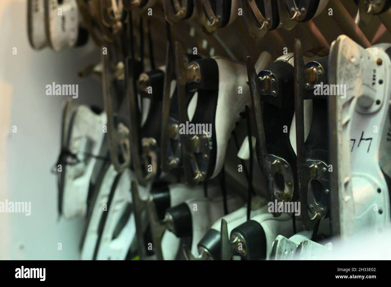 Winter sport. Ice skates for rent are in drying Stock Photo Alamy
