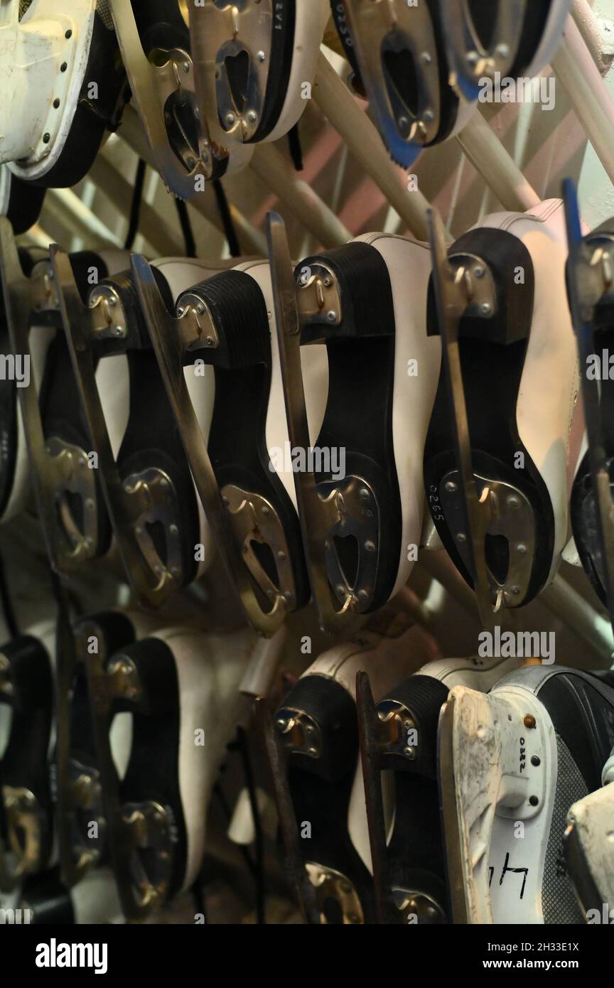 Winter sport. Ice skates for rent are in drying Stock Photo Alamy