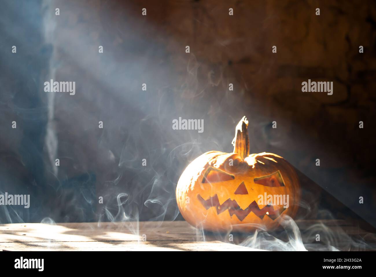 Jack O' Lanterns glowing in smoky fantasy night. Halloween background ...