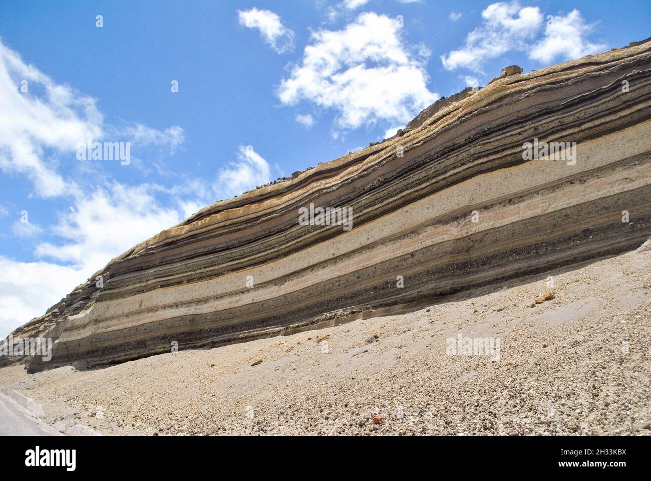 Stratified soil.  Layers of sedimentary rock in a montain in Chimborazo volcano area.  Chimborazo, Ecuador Stock Photo