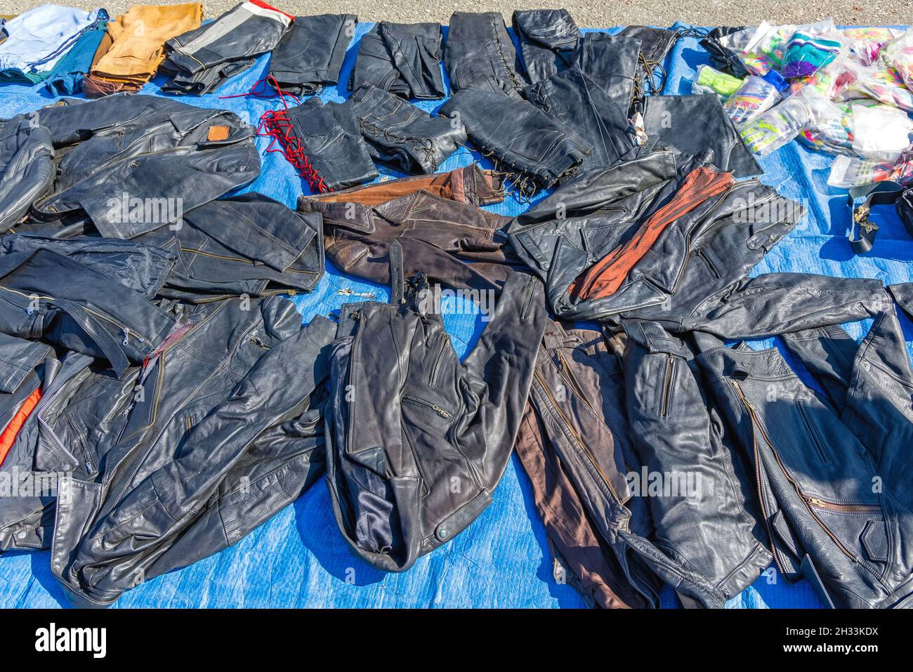 Used Leather Jackets for Sale at Flea Market Stock Photo