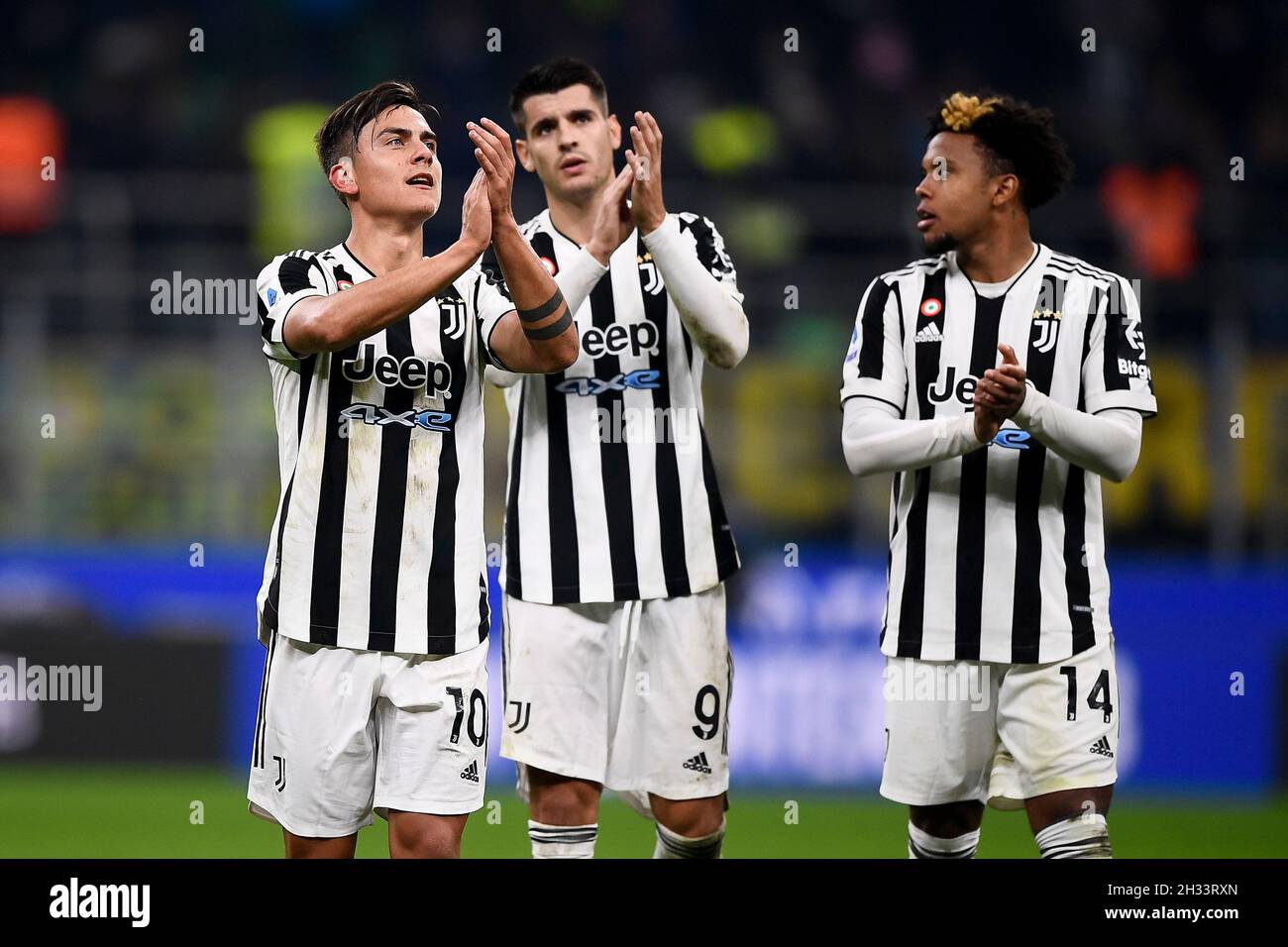 Milan, Italy. 24 October 2021. Paulo Dybala (L), Alvaro Morata (C) and Weston McKennie of Juventus FC greet the fans at the end of the Serie A football match between FC Internazionale and Juventus FC. Credit: Nicolò Campo/Alamy Live News Stock Photo