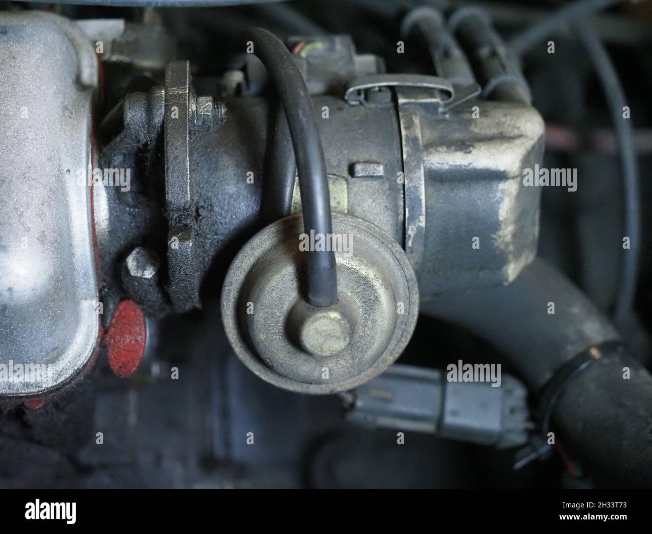 detail of car engine pipes and parts useful as an industrial background