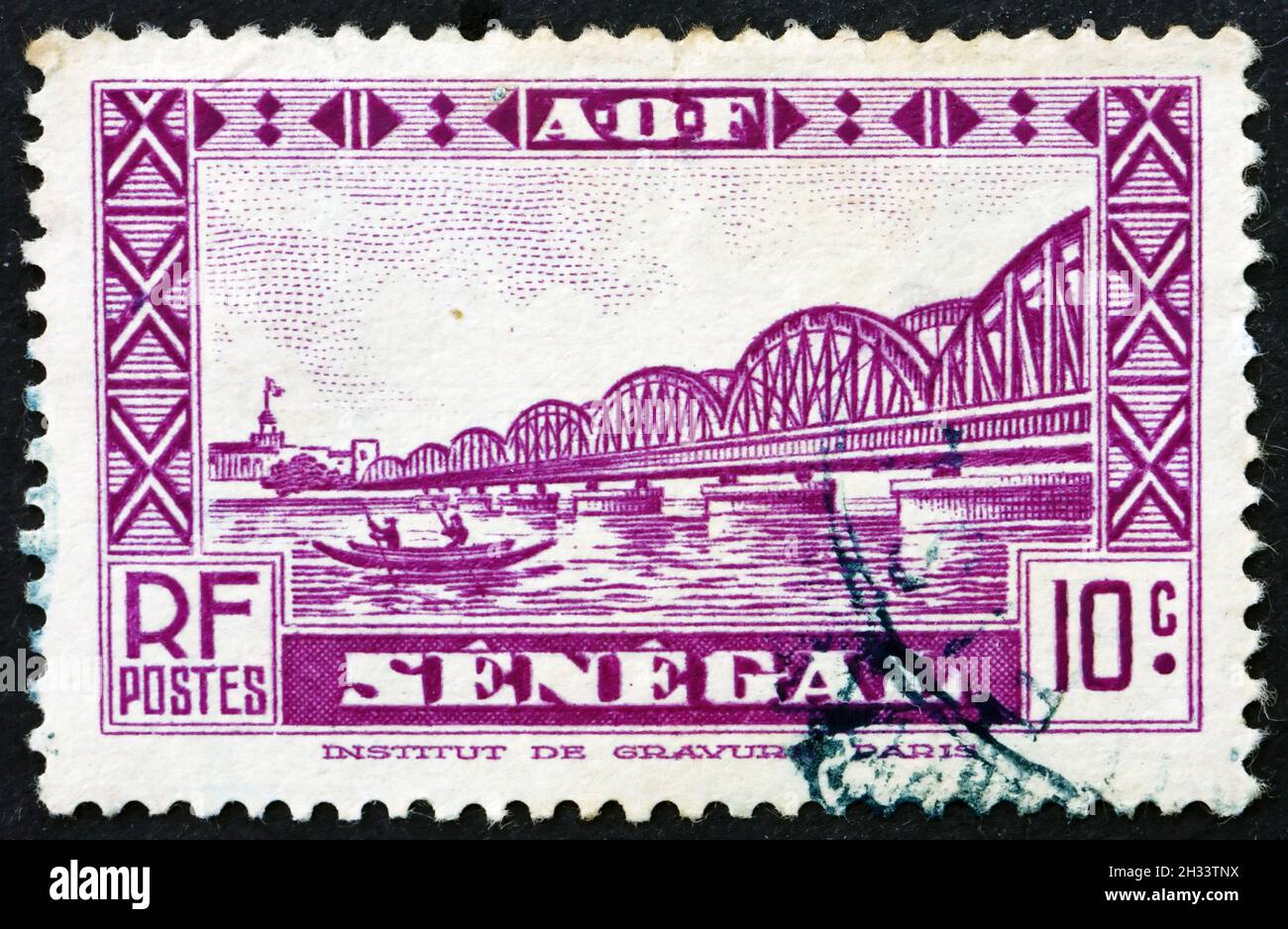 SENEGAL - CIRCA 1935: a stamp printed in Senegal shows Faidherbe Bridge, St. Louis, circa 1935 Stock Photo