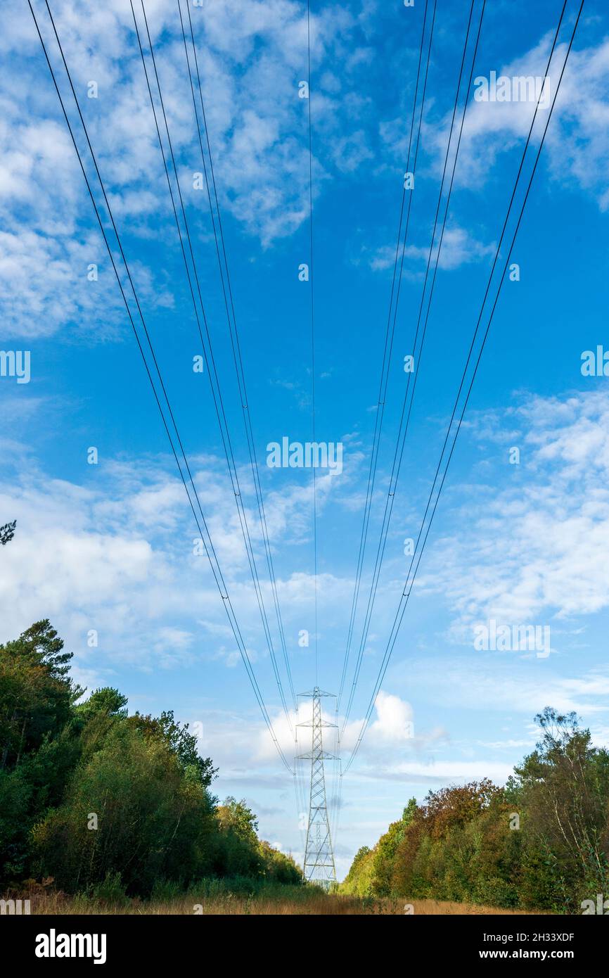 Pylon of the united Kingdom National Grid with overhead transmission