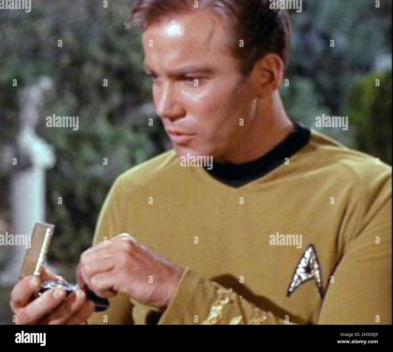 STAR TREK Viacom/CBS  sci-fi TV series with William Shatner as James Kirk using his Communicator Stock Photo