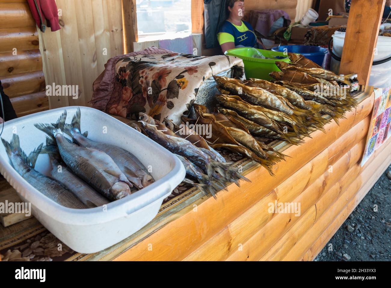Smoked Omul fish from Lake Baikal for sale along the road at Kultuk, Slyudyansky District, Irkutsk Oblast, Russia Stock Photo