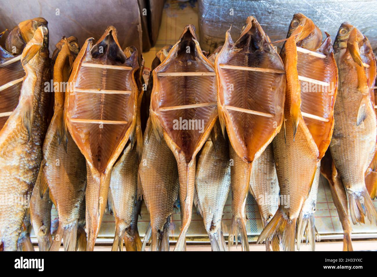 Smoked Omul fish from Lake Baikal for sale along the road at Kultuk, Slyudyansky District, Irkutsk Oblast, Russia Stock Photo