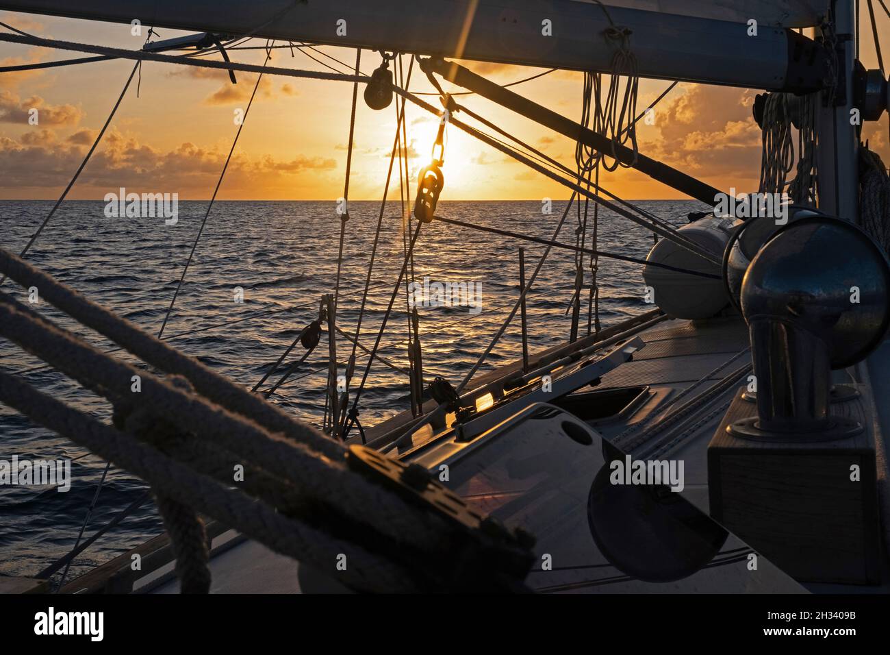 Sailing boat at sunset hi-res stock photography and images - Alamy