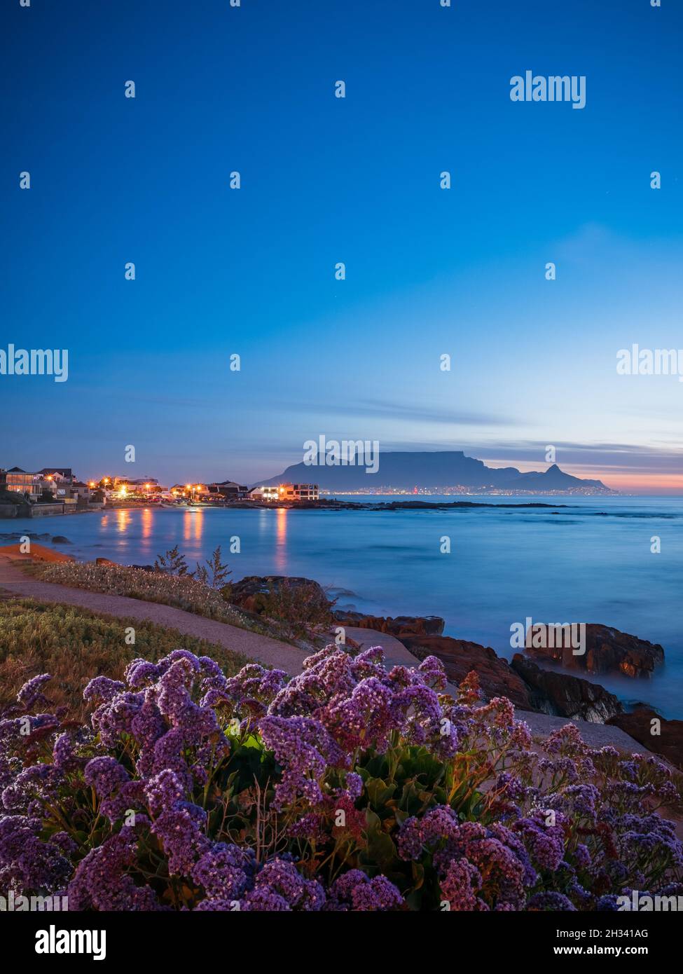 Evening view of Table Mountain viewed from Big Bay Blouberg Cape Town, Western Cape, South Africa. Stock Photo