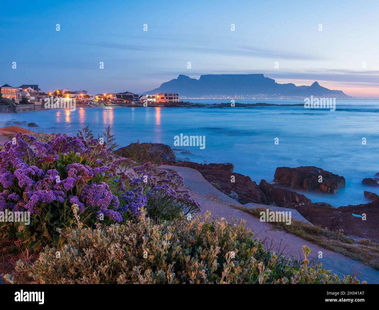 Evening view of Table Mountain viewed from Big Bay Blouberg Cape Town, Western Cape, South Africa. Stock Photo