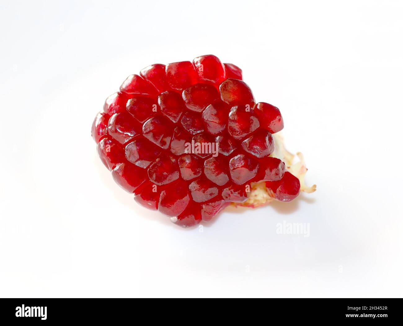 Red pyrope minerals garnet on a white background Stock Photo - Alamy