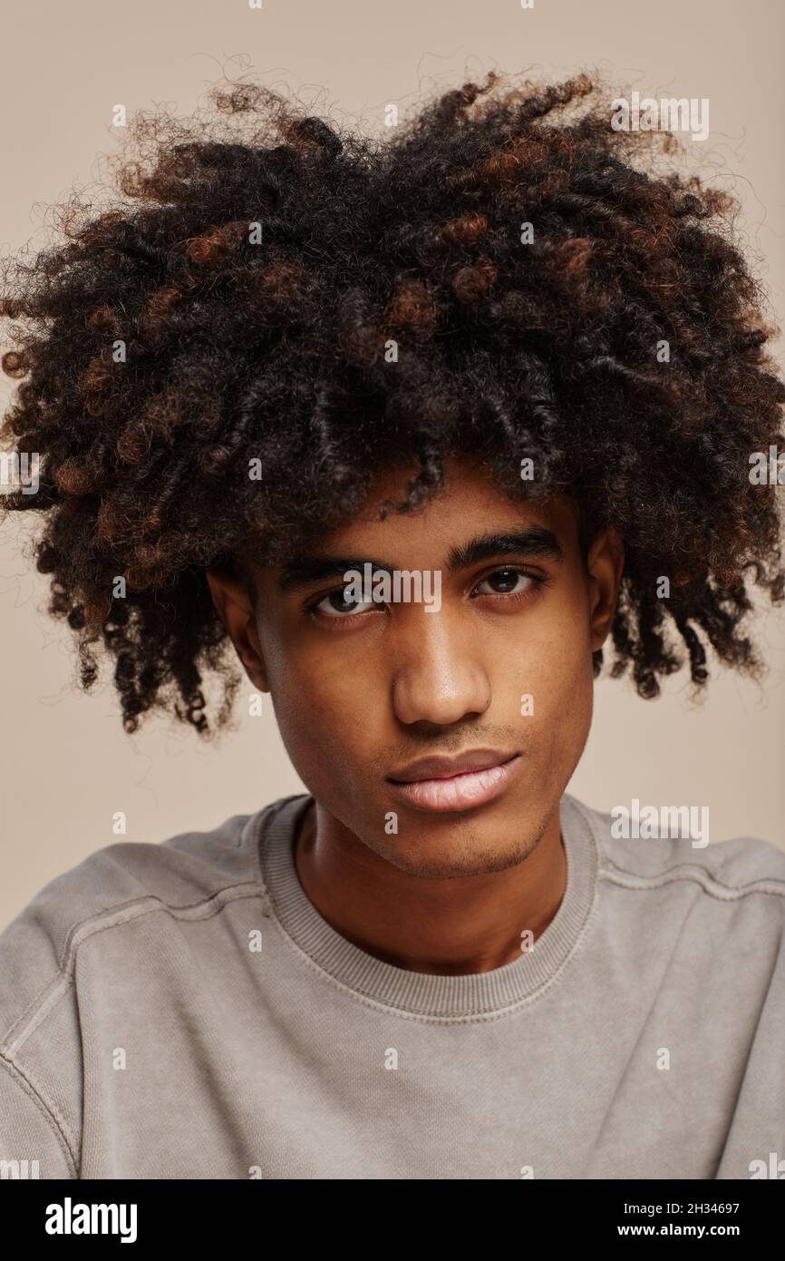 Young man with brown curly hair hi-res stock photography and images - Page 2 - Alamy Young man with brown curly hair hi-res stock photography and images - Page 2 - Alamy