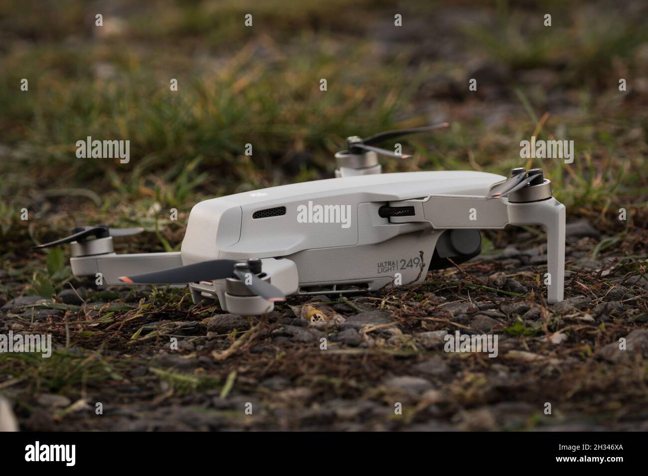 A dji mini 2 drone in action in jena at autumn, copy space Stock Photo