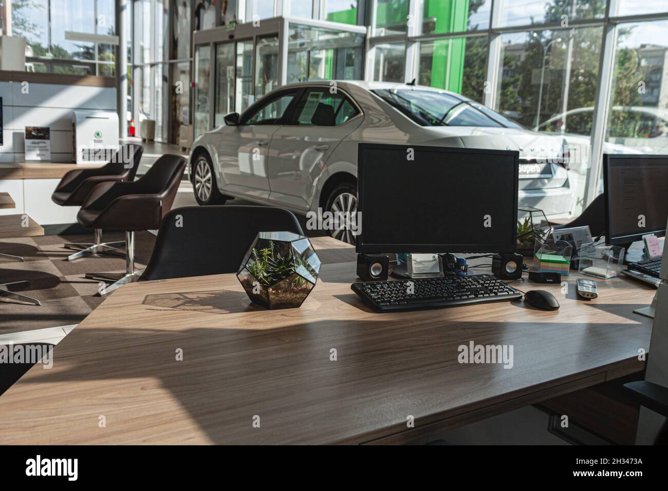 View of the Skoda brand car dealership from the workplace of the sales manager. Russia Moscow 21.08.21. Stock Photo
