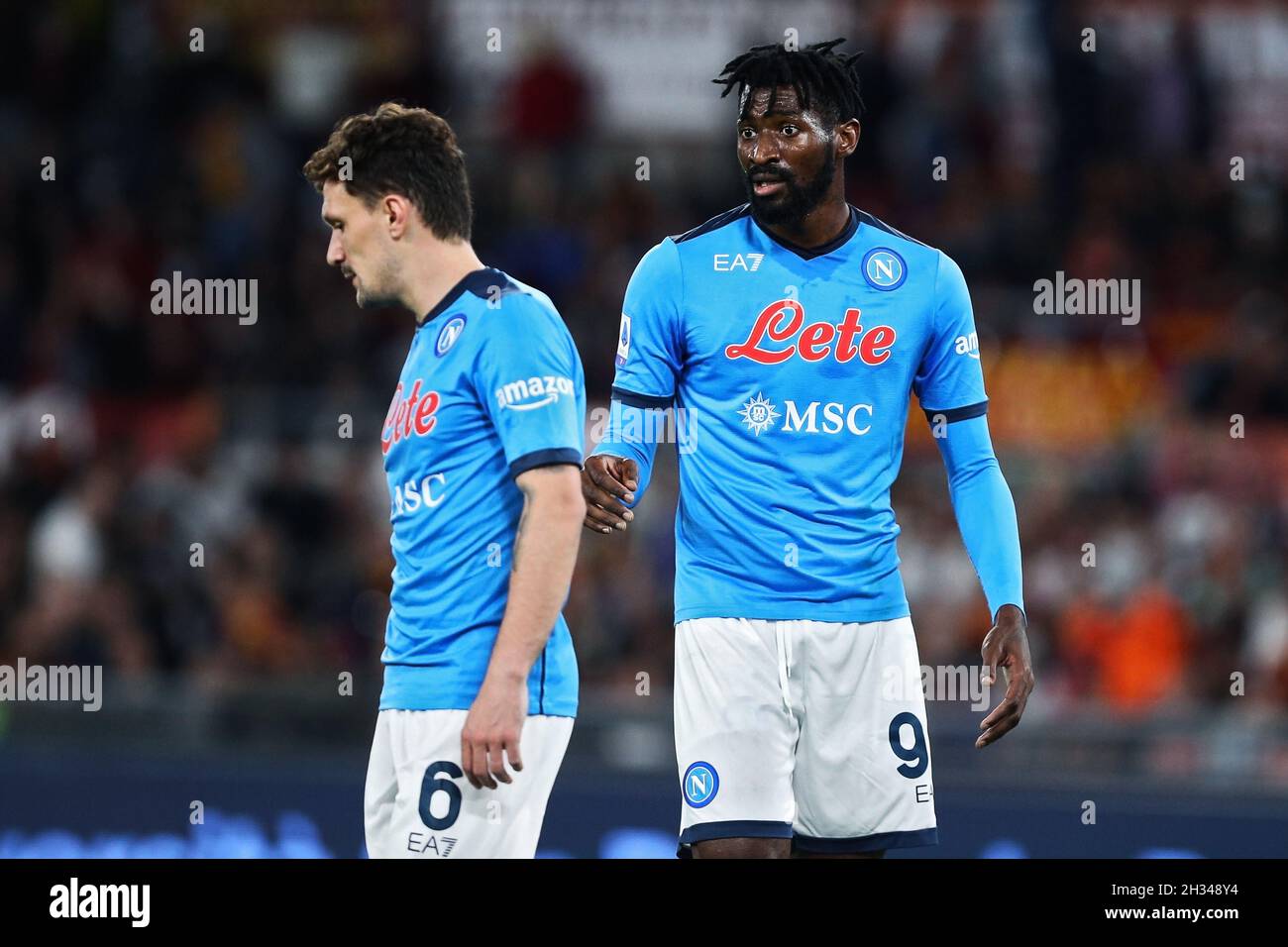 Andre' Anguissa (R) talks to Mario Rui (L) of Napoli during the Italian  championship Serie A football match between AS Roma and SSC Napoli on  October 24, 2021 at Stadio Olimpico in
