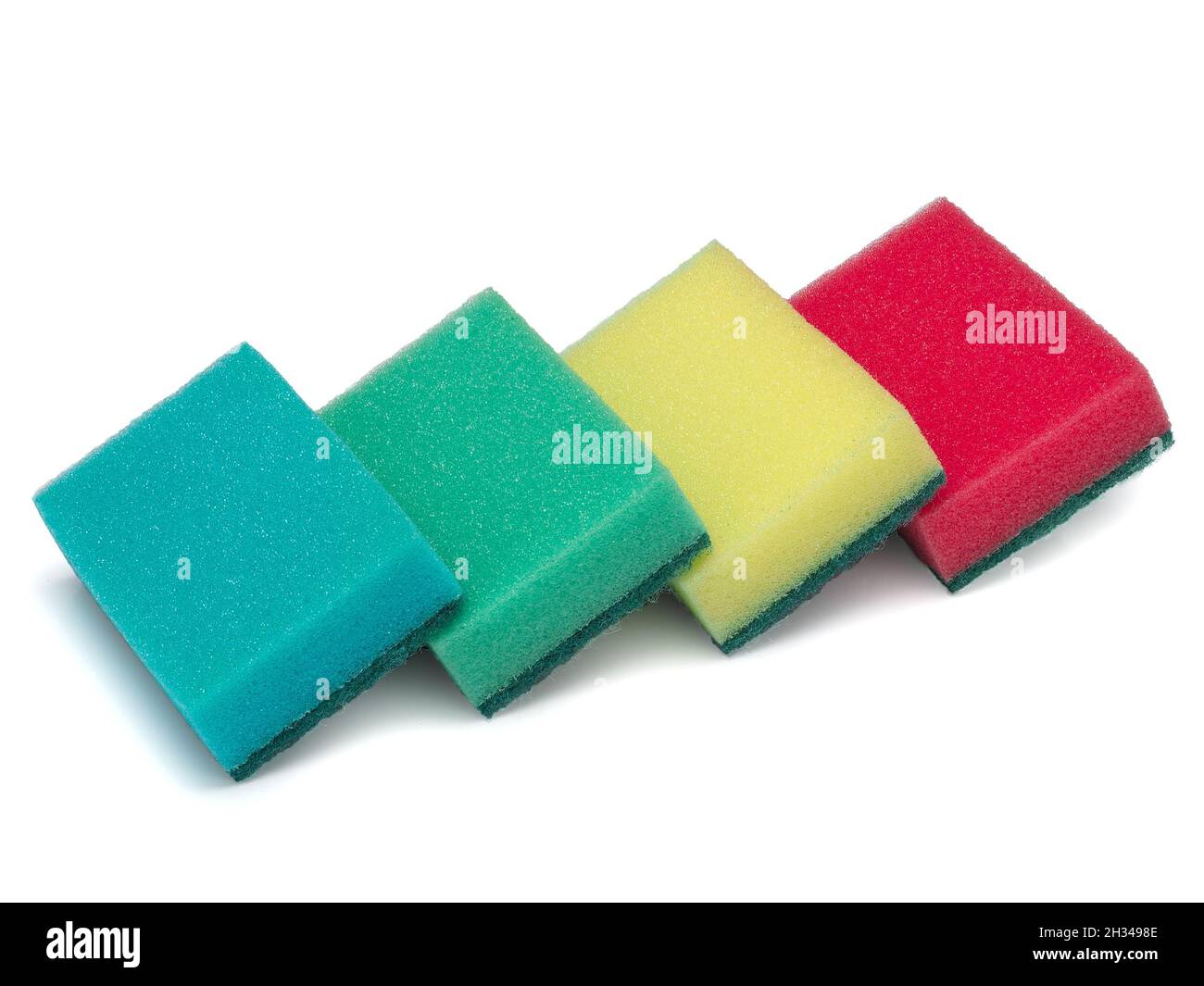 Colored sponges for washing dishes and other domestic needs. Stock Photo
