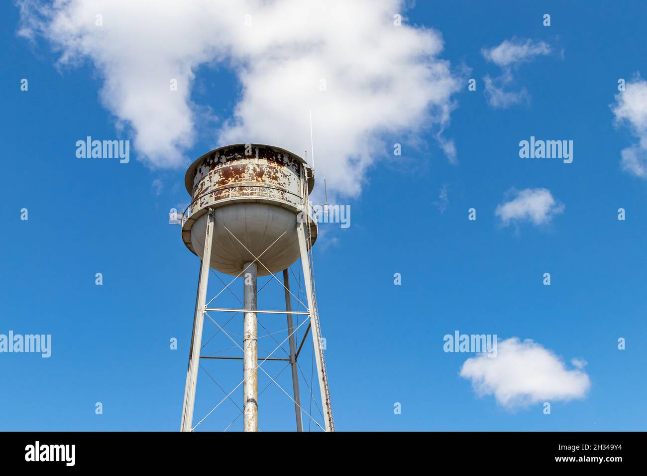 Old, rusty water tower. clean drinking water, water supply shortage and pollution concept Stock Photo