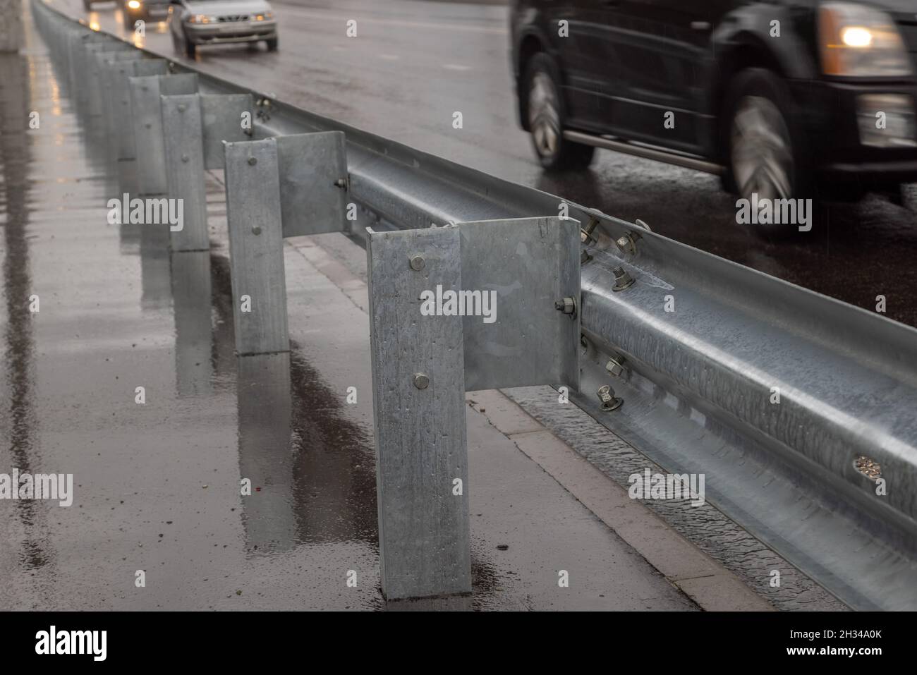 underscrewed nuts and bolts in highway road railing Stock Photo Alamy