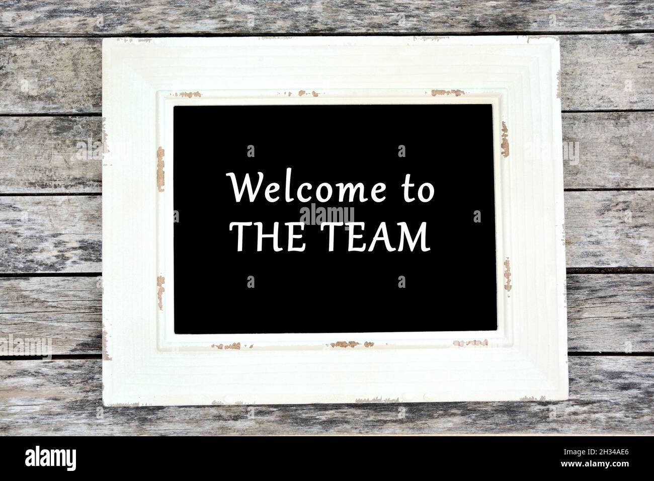 Welcome to the team text on blackboard. Top view Stock Photo