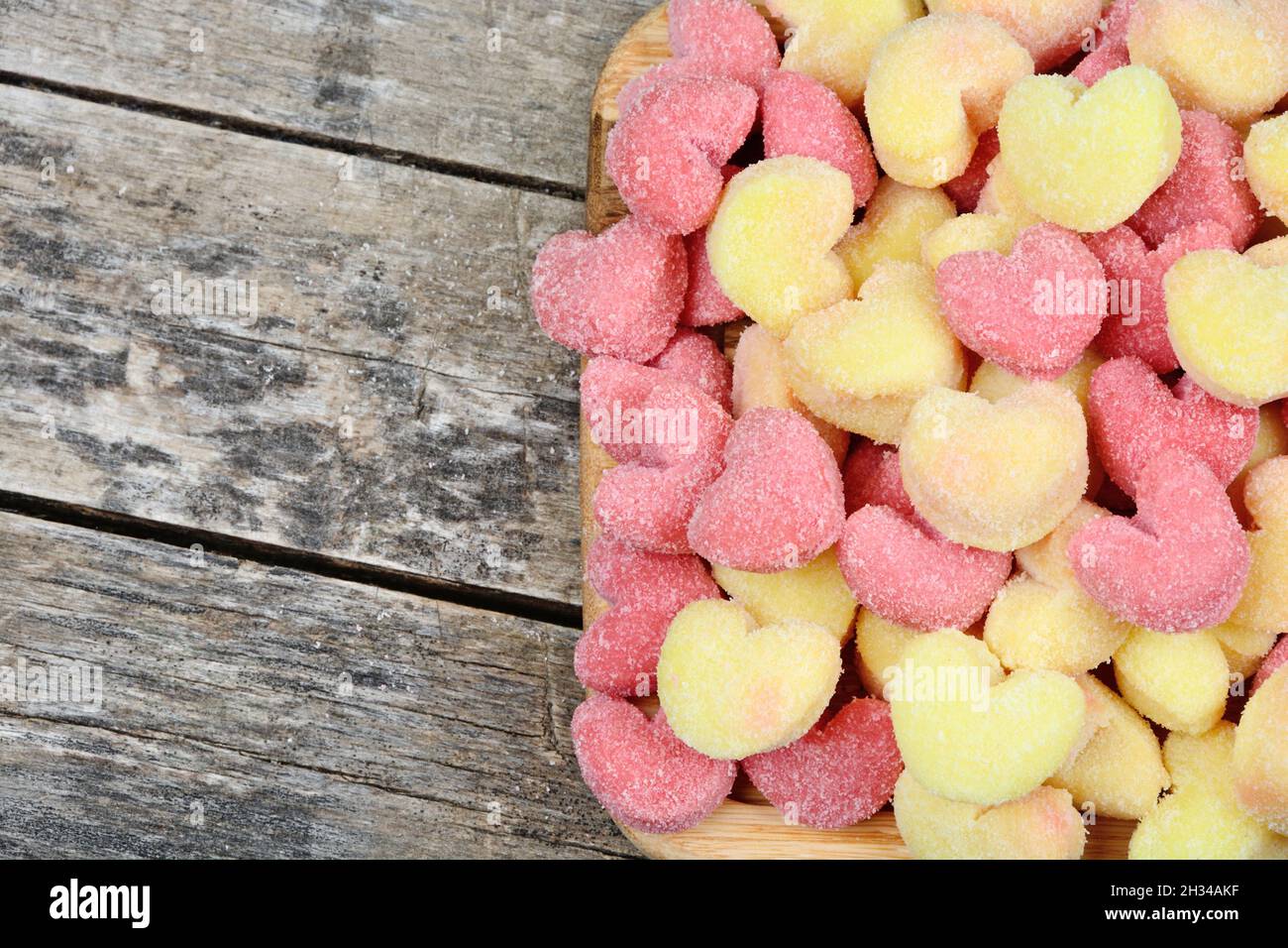 Many colorful gnocchi on a wooden cutting board close-up Stock Photo
