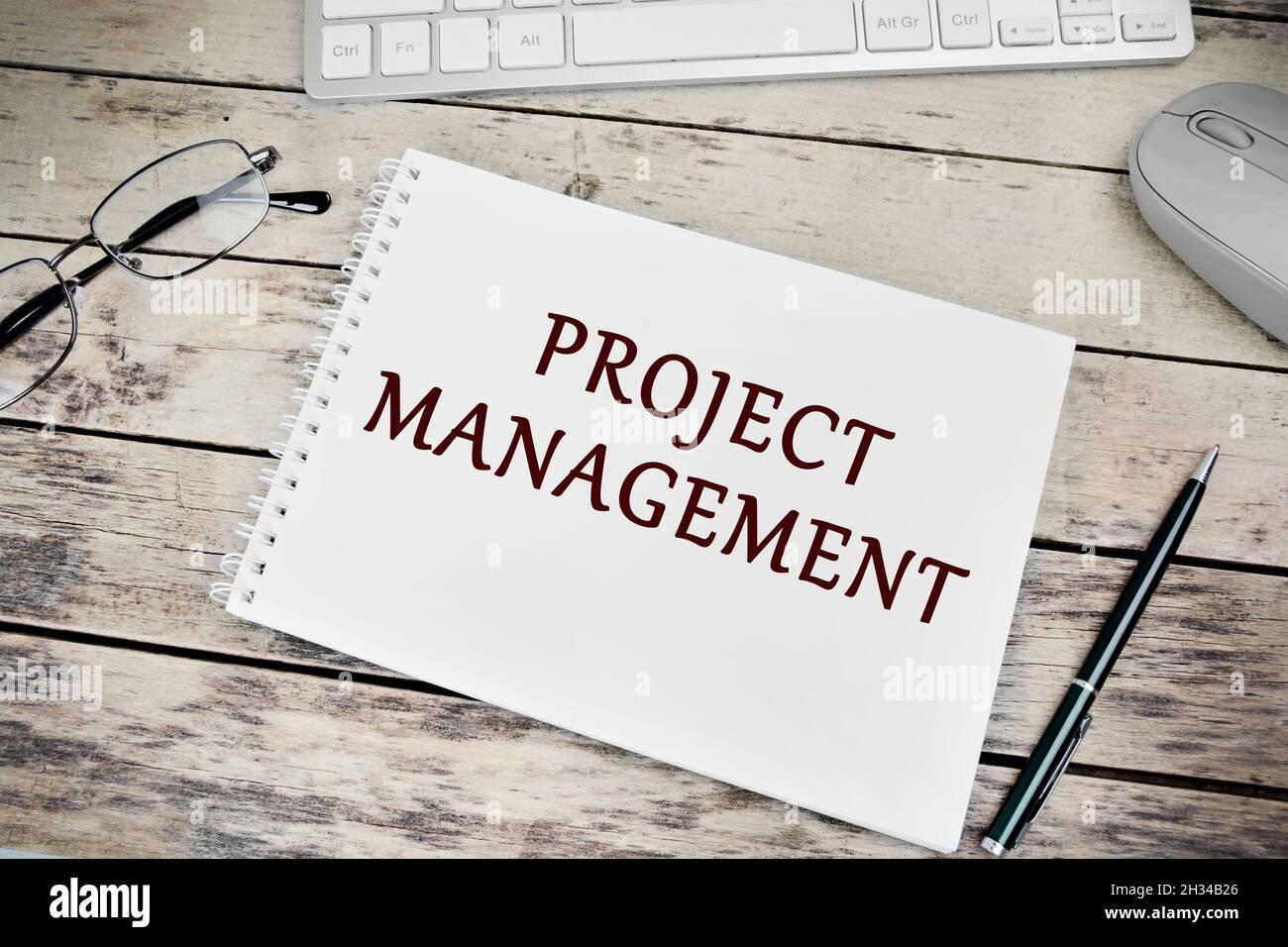 Project management words on notebook page Stock Photo