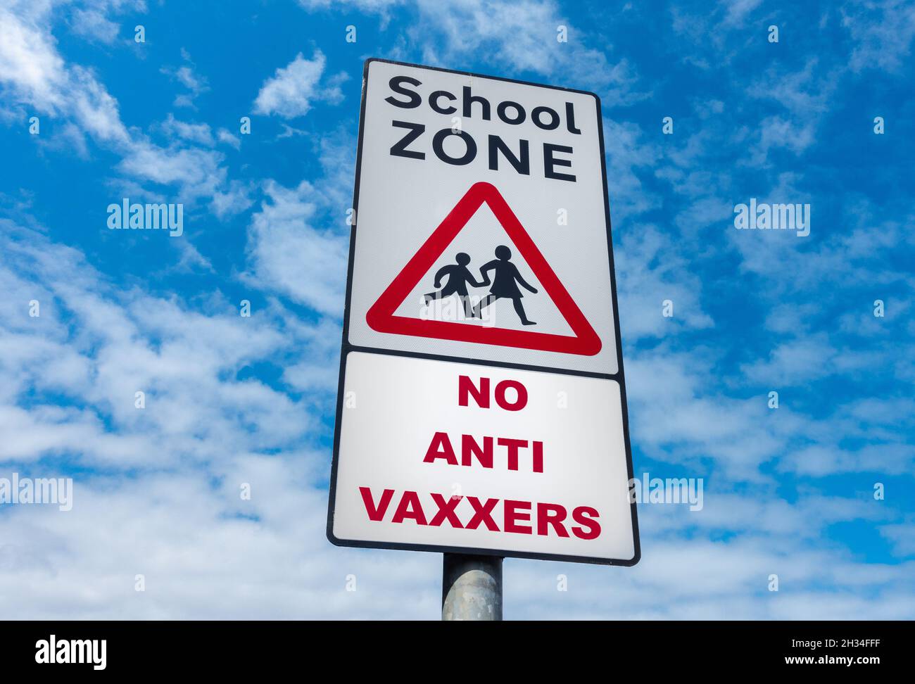 No anti vaxxers on school zone sign. Anti Covid, coronavirus vaccine, vaccination concept image Stock Photo