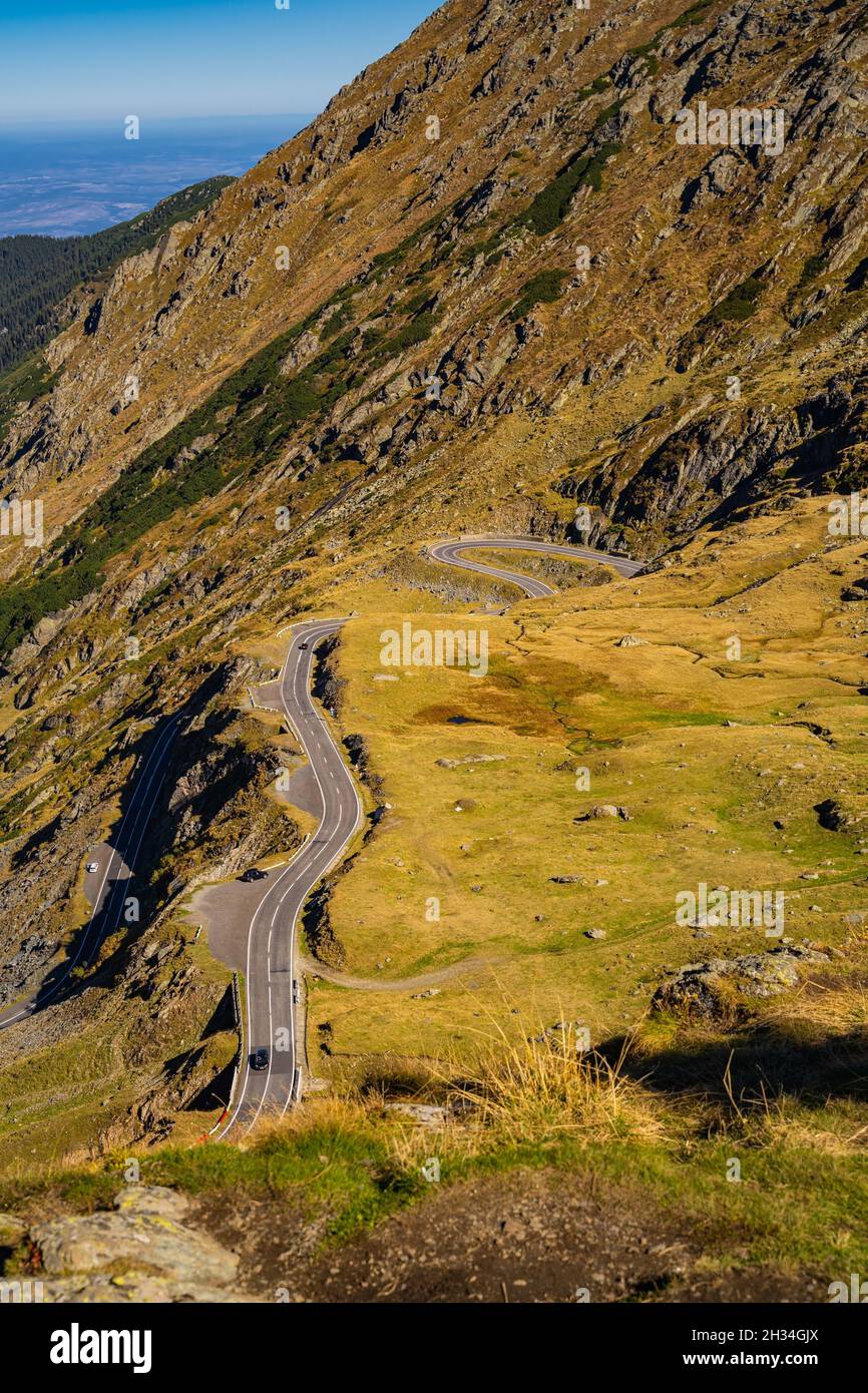 Vertical shot of a road in a mountain Stock Photo - Alamy