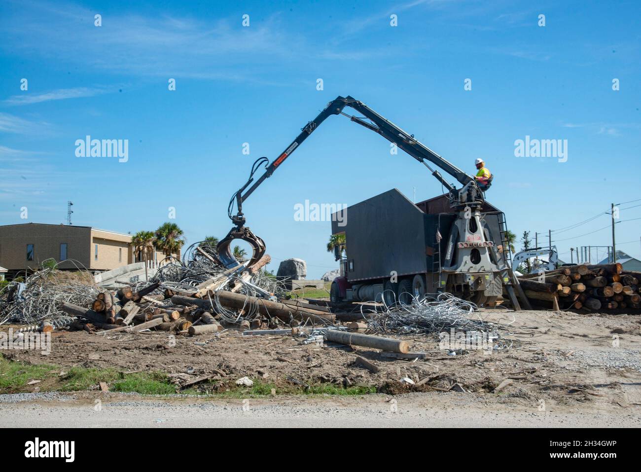 Grand Isle, United States of America. 16 October, 2021. FEMA workers assist with debris removal from homes and properties in the aftermath of Hurricane Ida weeks after the devastating Category 4 storm struck the region October 16, 2021 in Grand Isle, Louisiana.  Credit: Patsy Lynch/FEMA/Alamy Live News Stock Photo